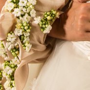 close up wrist bouquet with Kalanchoe