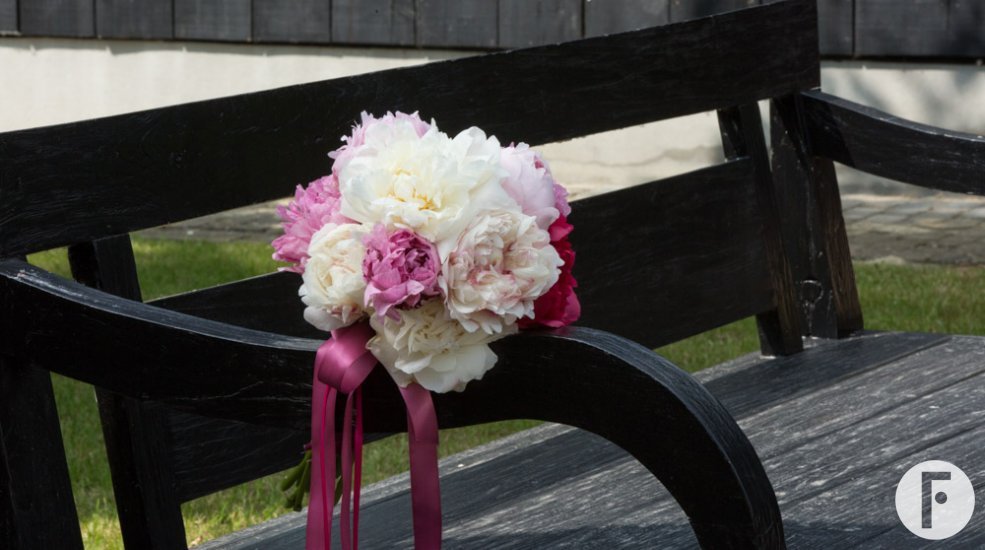 Elegant wedding bouquet with peonies