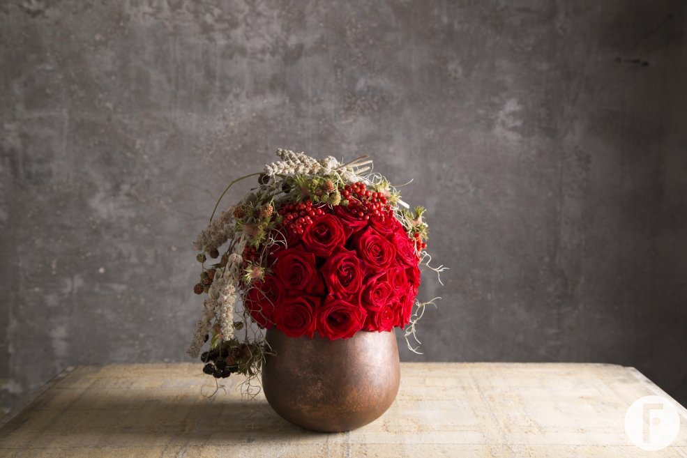 Red Eagle rose arrangement Pim van den Akker